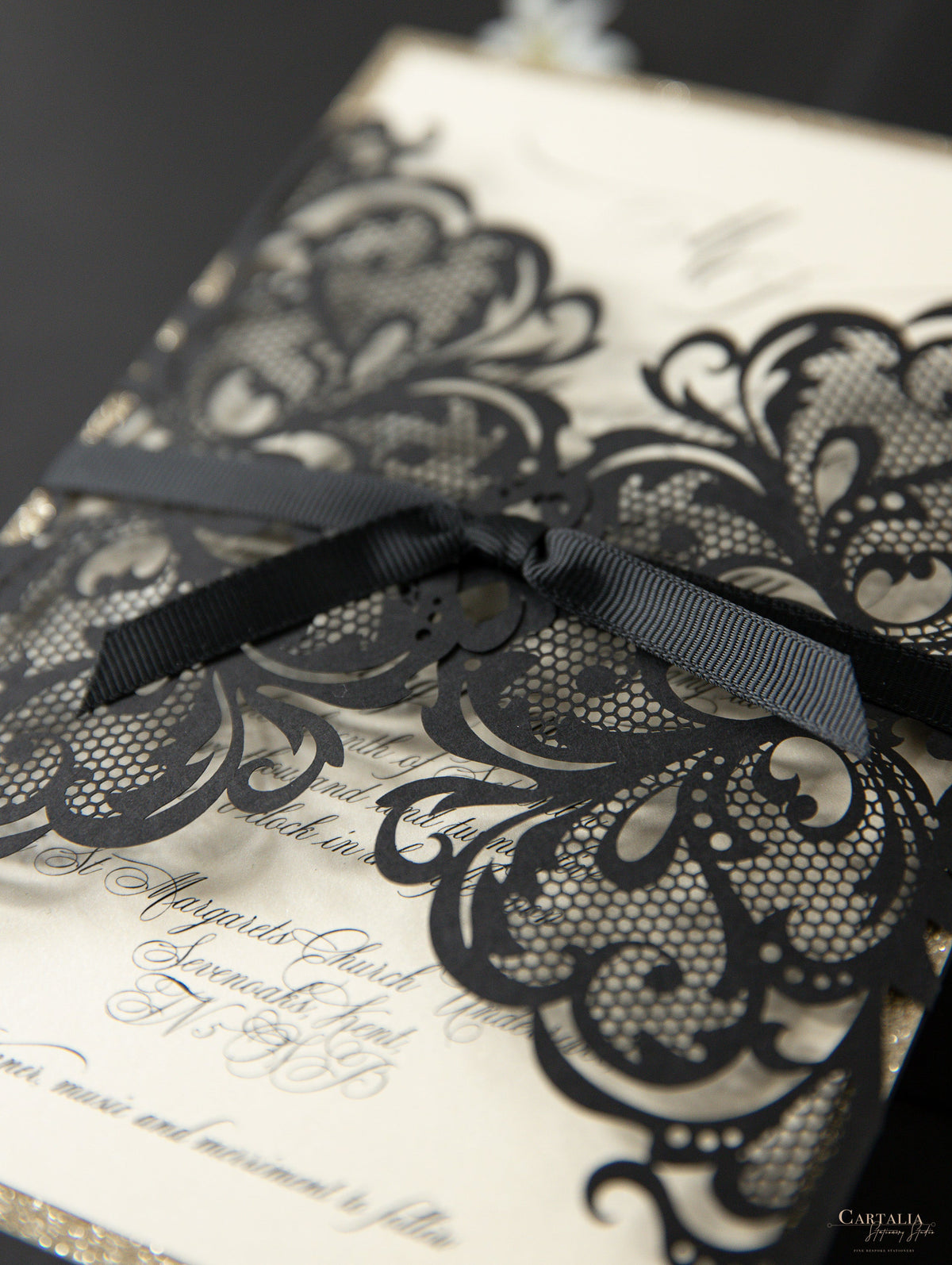 Black Opulence Elegant Laser Gatefold with Ribbon Tie design and Gold Glitter.