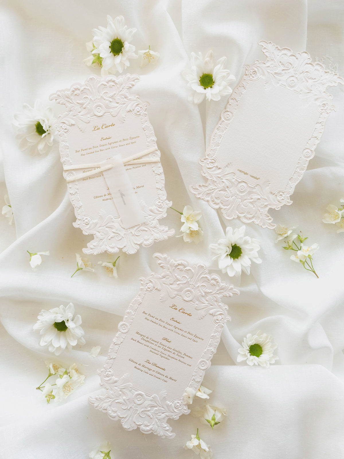 Sculpted Elegance | A Menu with 3D Sculpted Embossing on Cotton Card with Gold Foil