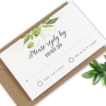 Invito serale con set di nozze rustiche con fogliame verde