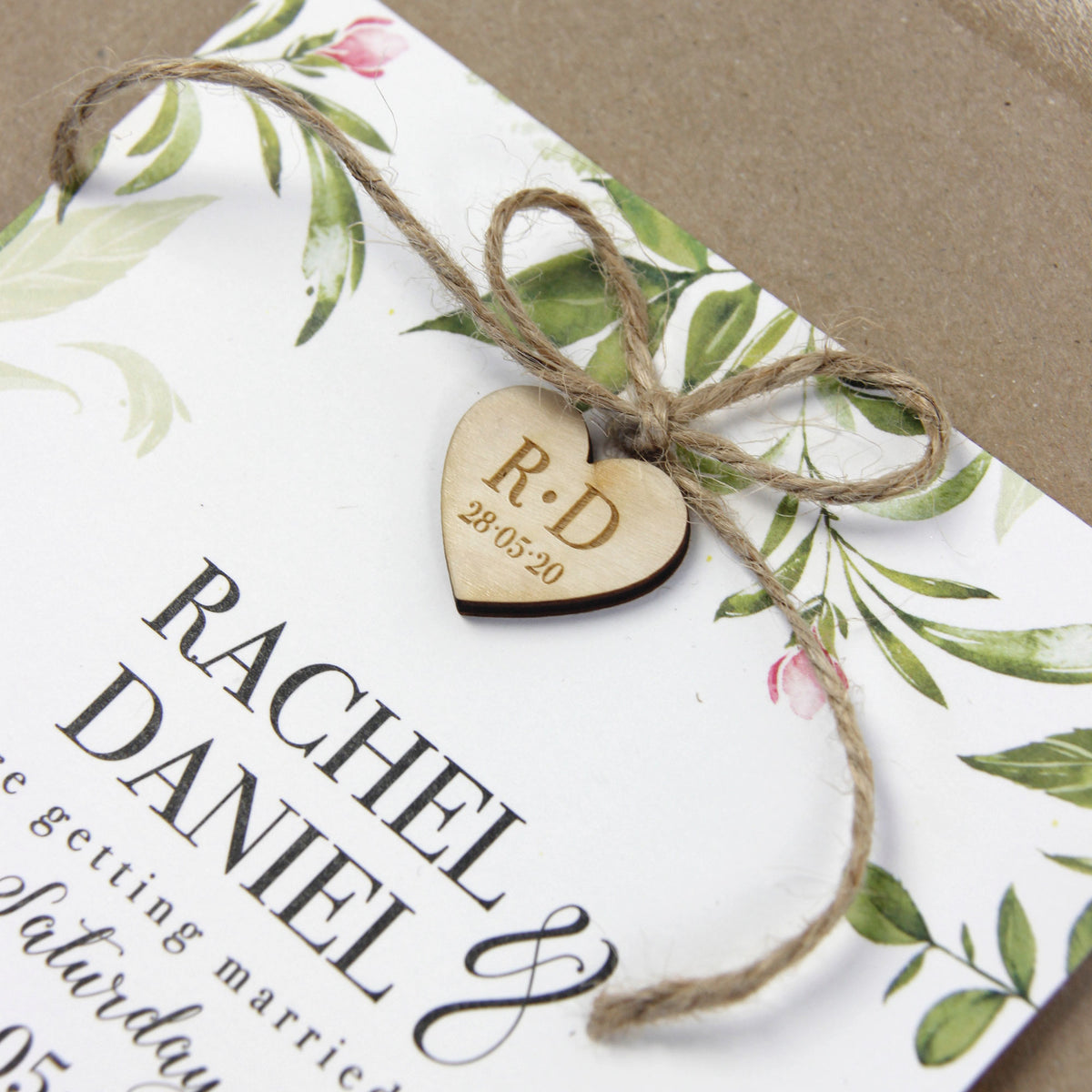 Day Invitation with Green Foliage Engraved Wooden Heart Tied in Jute String and Kraft Envelopes