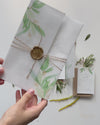 Greenery Vellum Sleeve Pocket fold Invitation with Gold Tie and Kraft Envelopes and add on of Pearl Wax Seal