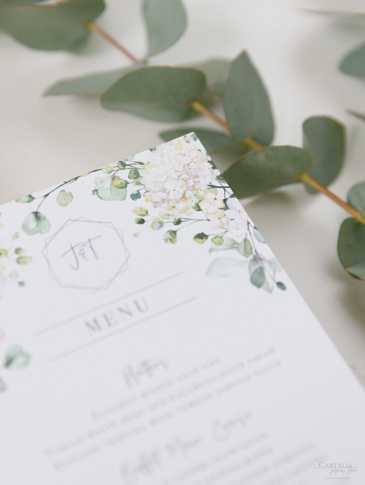 White Hydrangea Menu Cards With Gold Foiled Hexagon Shape