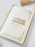 Suite di invito di lusso in scatola con specchio dorato e champagne con disegno della sede in lamina | M&amp;O su commissione su misura
